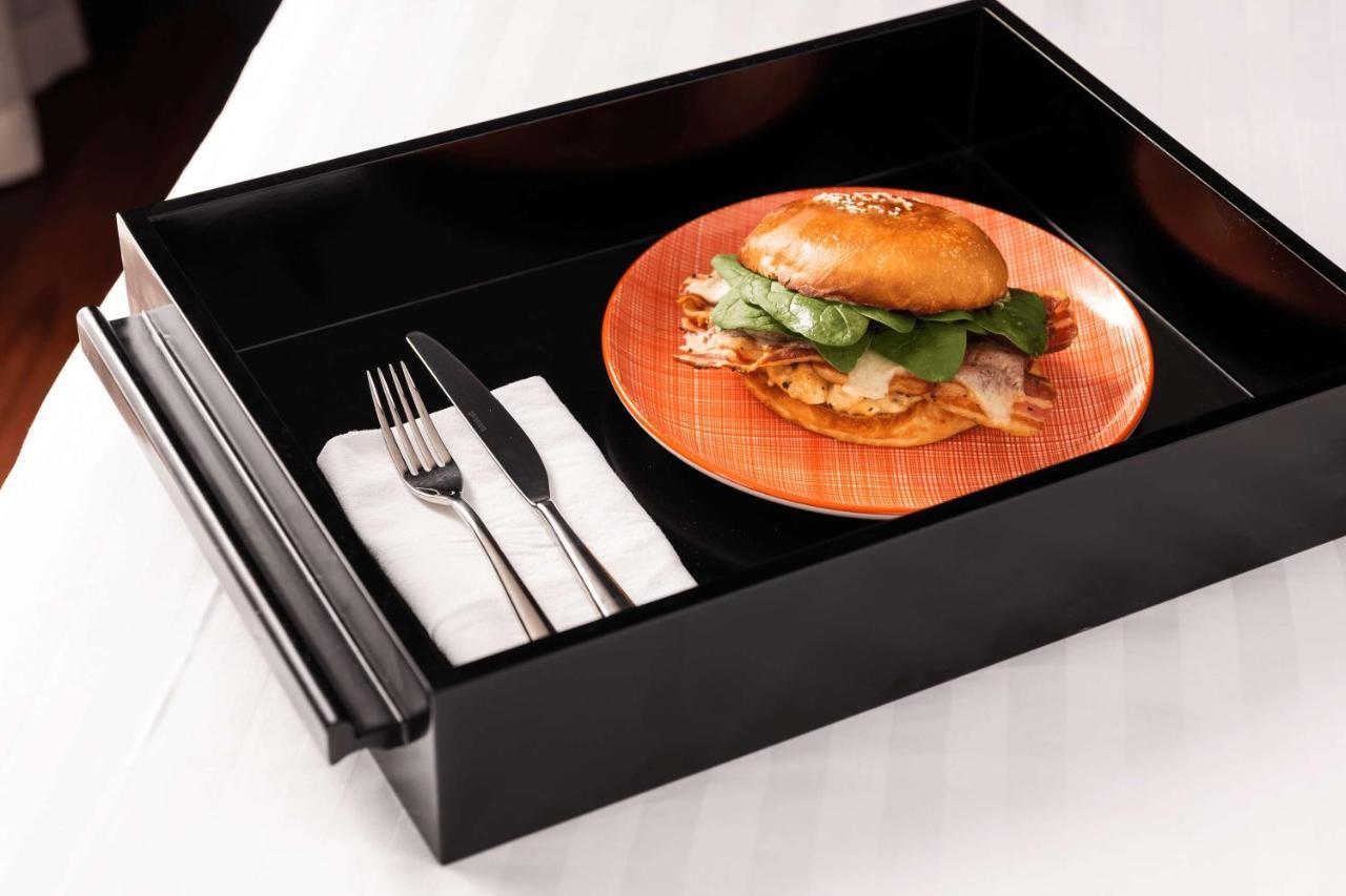 Qt Perth Hotel Exterior photo A wooden plate