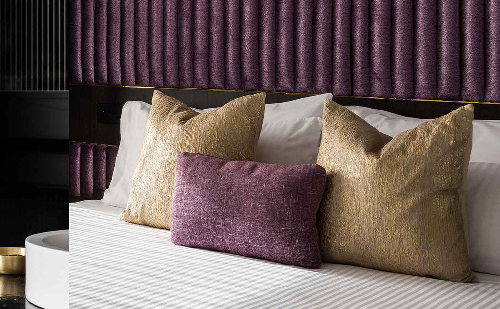 Qt Perth Hotel Exterior photo A bed with cushions
